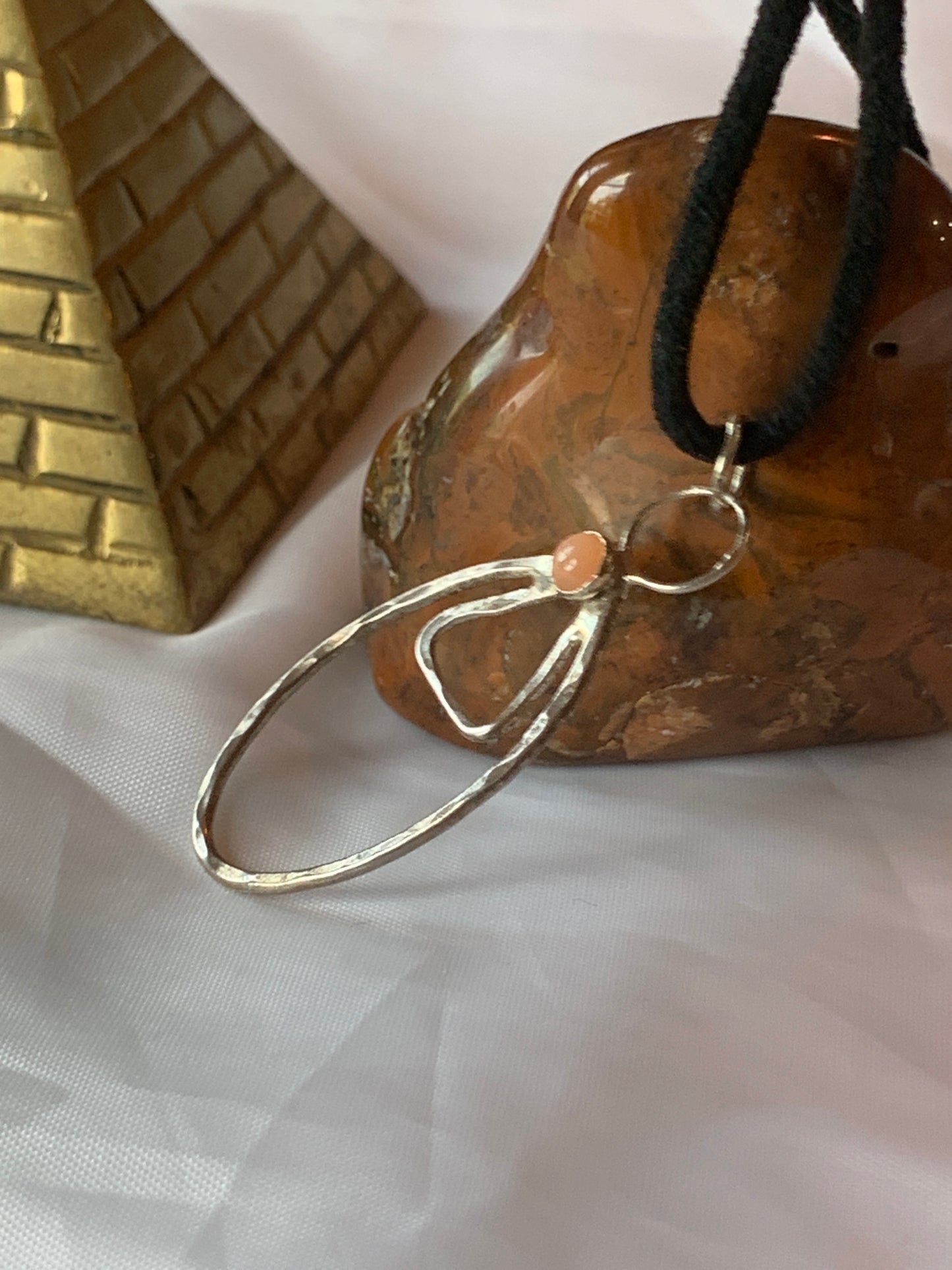 This pendant, proudly made in the USA, showcases the artistry and precision of our skilled artisans. Its design is a harmonious blend of simplicity and meaning, making it a versatile and symbolic addition to your jewelry collection.