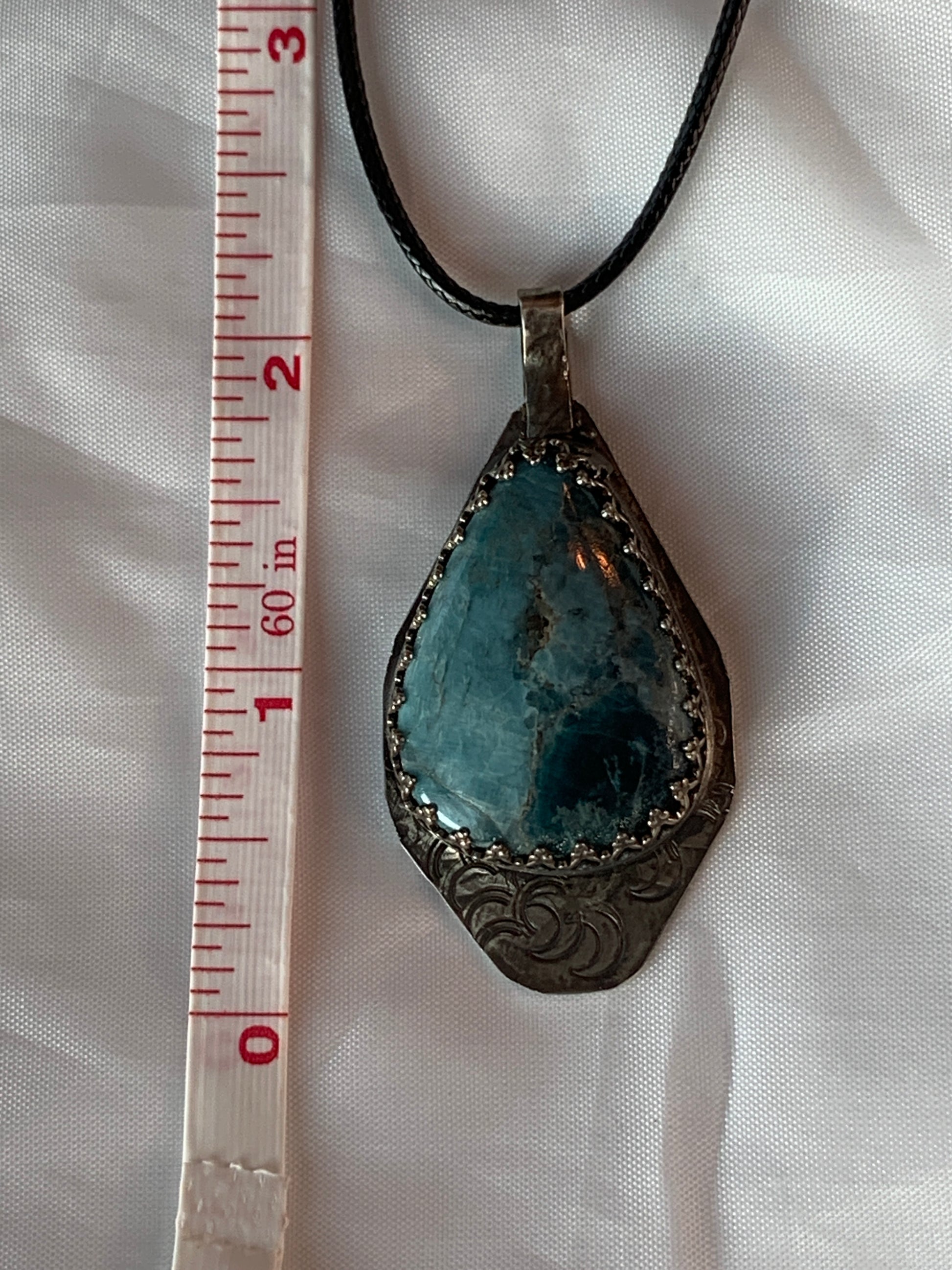 Embrace the fusion of elegance and tranquility with our Large Oxidized Hammered Moon Shattuckite Sterling Silver Pendant. It's more than just a piece of jewelry; it's a symbol of authenticity, inner peace, spiritual communication, and the enduring allure of handcrafted craftsmanship.