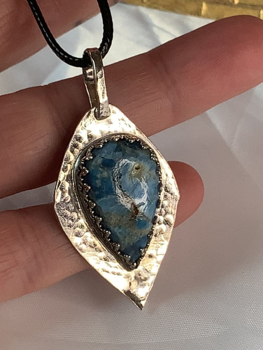 Blue Apatite gemstone, renowned for its deep blue hues and its connection to inspiration and clarity.