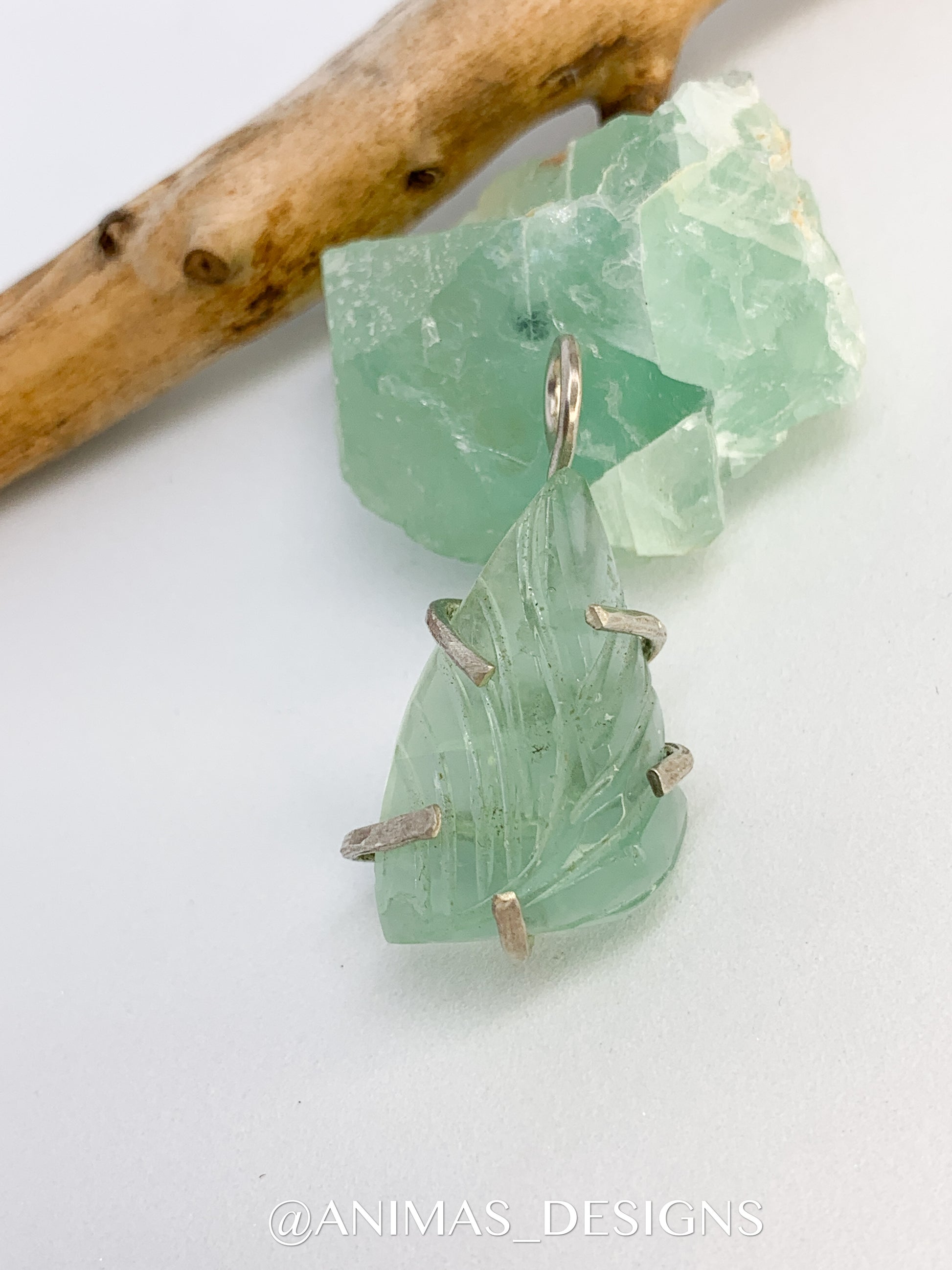 Carved Fluorite Sterling Silver Pendant . Handmade and one of a kind design. Unique jewelry designs. Small business owned. 