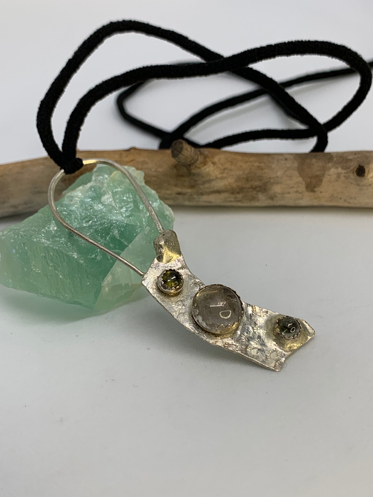 Geometric, abstract design. Sterling Silver Rutile Quartz Green Tourmaline Pendant Necklace. Handmade and one of a kind designer jewelry. Made in Colorado. 